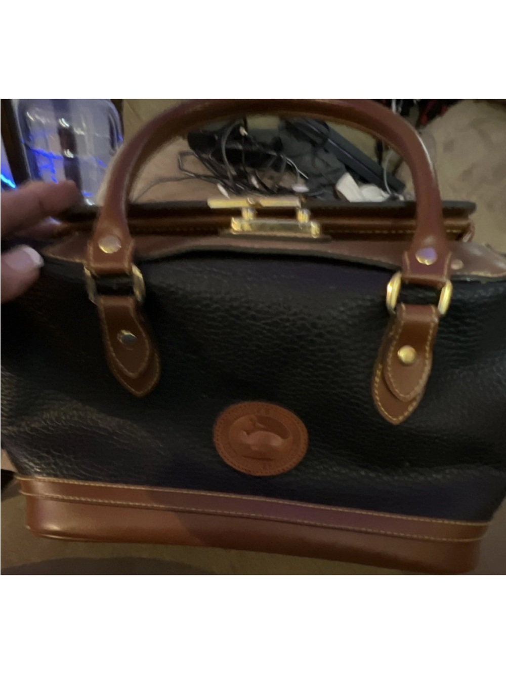 Dooney & Bourke Black Leather Bag with Brown Logo Patch